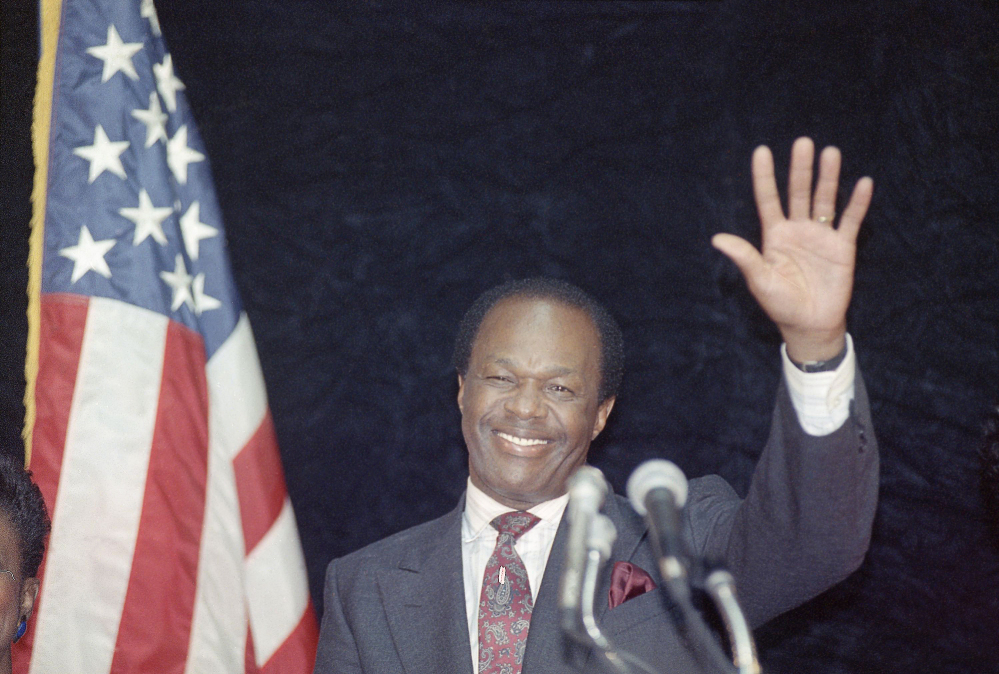District of Columbia Mayor Marion Barry waves to supporters after addressing city employees in Washington in March 1990. Barry, who staged a comeback after a 1990 crack cocaine arrest, died early Sunday morning. He was 78.
