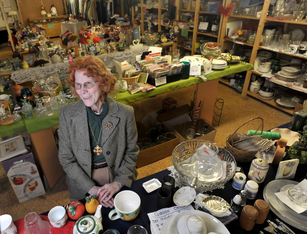 WATERVILLE, MAINE - NOVEMBER 21, 2014. 
 Essie Golden, of Bingham, among the donated merchandise at the resale shop at Hospice Volunteers of Waterville Area on Main Street on Friday, Nov. 21, 2014. (Staff photo by Michael G. Seamans)