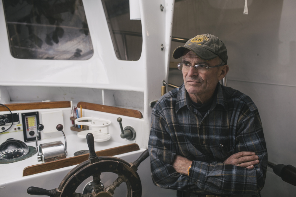 Tim Tower gives an interview Wednesday on his boat in York. Tower uses the boat to charter recreational deep-sea fishing trips. Additional federal fishing regulations have been put on cod, prohibiting recreational fishermen from keeping any cod they catch.