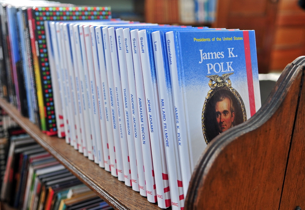 Staff photo by Joe Phelan
A biography of James K. Polk is on the end of a shelf at the North Monmouth Library on Friday in North Monmouth.