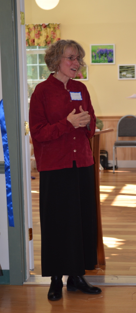 Margaret Godfrey listens to her daughter, Jill Godfrey, give a speech at the Sunset Home’s recent 90th anniversary celebration.