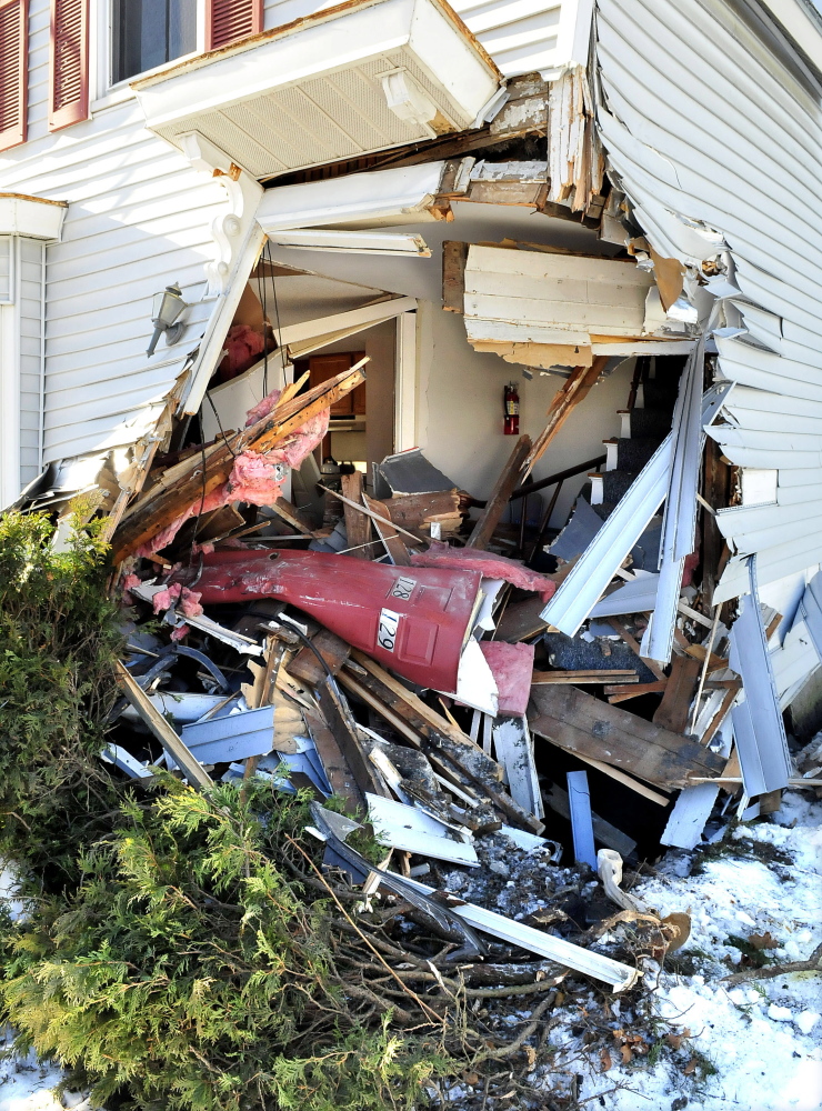 The damage left on a home on Madison Avenue in Skowhegan after a tractor trailer struck the building on Tuesday.