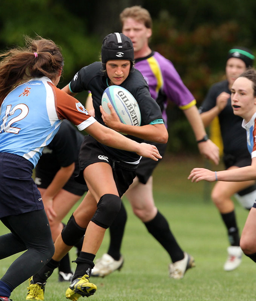 Anna Piotti runs during a recent rugby match for Bowdoin College.