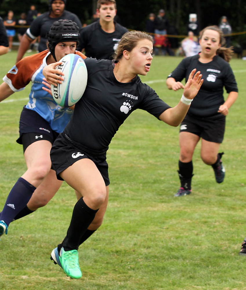 Georiga Bolduc looks for running room during a recent rugby match for Bowdoin College.