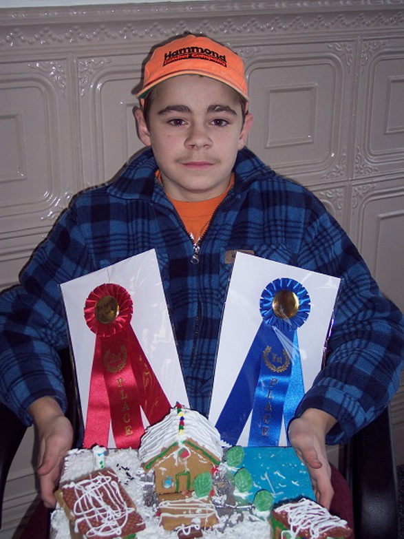 Ethan Knox, of Madison, won Professional and People’s Choice in children 9-12 years old category, for his cabin in the woods.