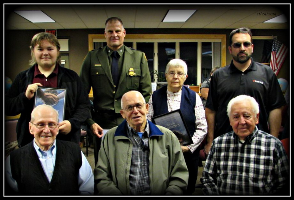 Front, from left World War II veterans Rene Morin, Leo Beaudreau and Wallace Bisson. Back, from left, David O’Sickey, Reggie Felker, Louisa Quirion and Boyd Fortier.