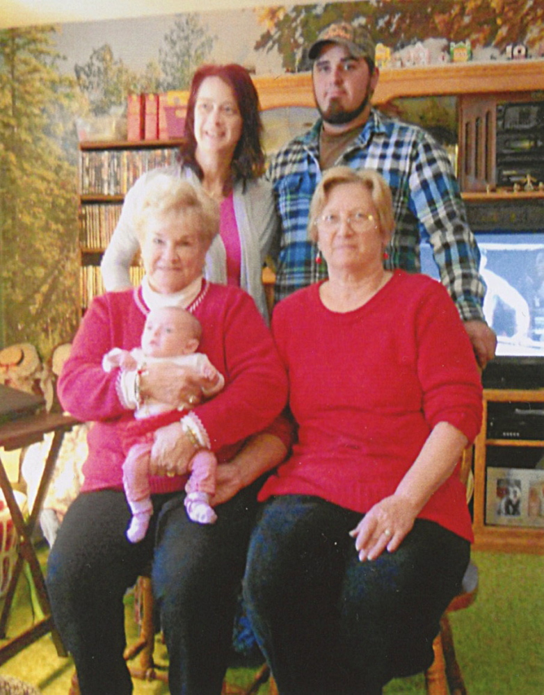 Front, from left, great-great-grandmother Jackie Herber, of Hallowell, holding Autumn May Caswell, of Richmond, and great-grandmother Jennifer Reynolds; and back, from left, grandmother Heidi Caswell, of Minot, N.D., and father Stephen Caswell, of Richmond.