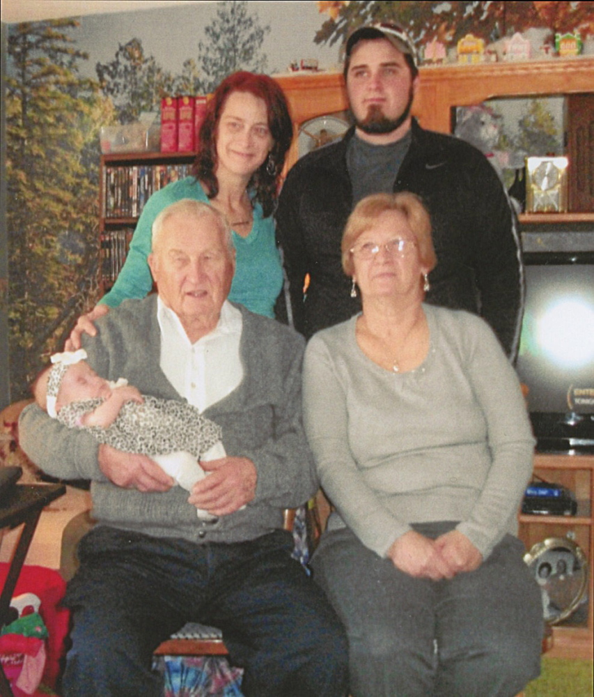 Front, from left, great-great-grandfather Harold Jones Sr., of Augusta, holding Autumn May Caswell, of Richmond, and great-grandmother Jennifer Reynolds, of Richmond; and back, from left, grandmother Heidi Caswell, of Minot, N.D., and father Stephen Caswell, of Richmond.
