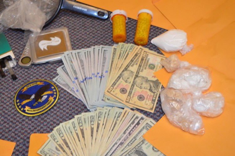 Drugs and money seized in the Wednesday raid at an Augusta motel.