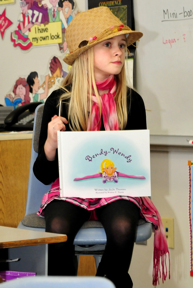 Lydia Schofield, 9, of Thorndike, meets with fifth-graders at Cascade Brook School in Farmington to talk about her new book, “Bendy Wendy,” which started when she and her mother would play a car game involving rhyming words.