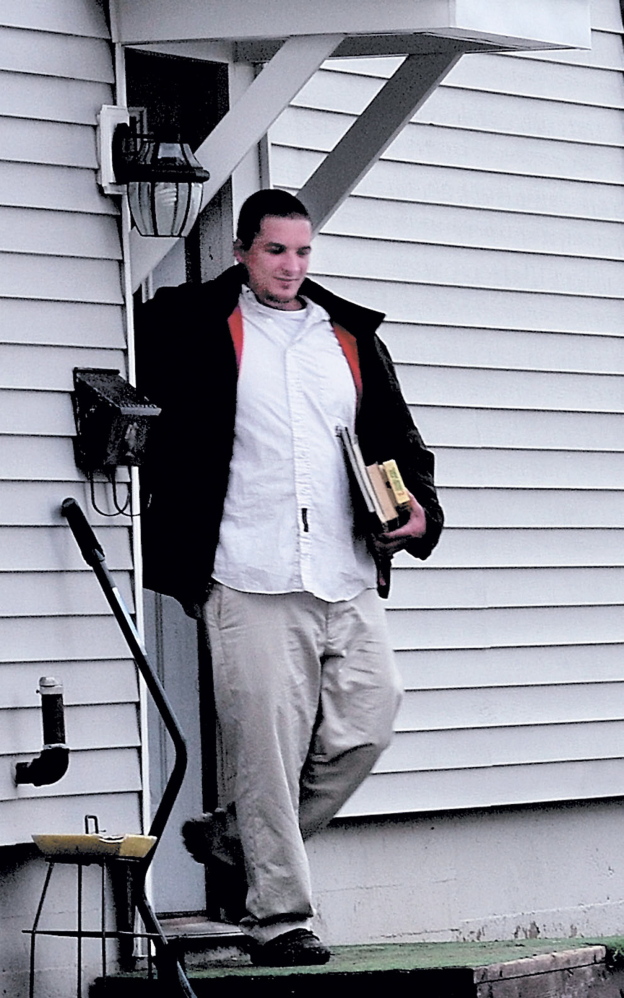 Lance DiPietro, Justin DiPietro’s brother, leaves 29 Violette Ave. in Waterville in December 2011 after Ayla Reynolds was reported missing from the home.