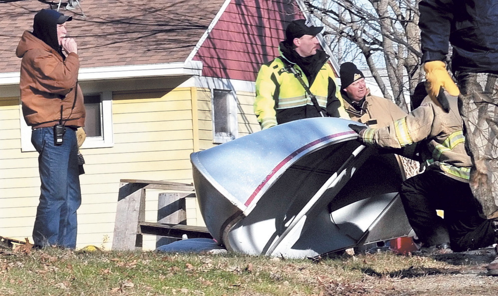 Waterville and Winslow fire personnel and game wardens conduct an extensive search of yards and outbuildings along Violette Avenue in Waterville and surrounding streets after Ayla Reynolds was reporting missing Dec. 17, 2011.