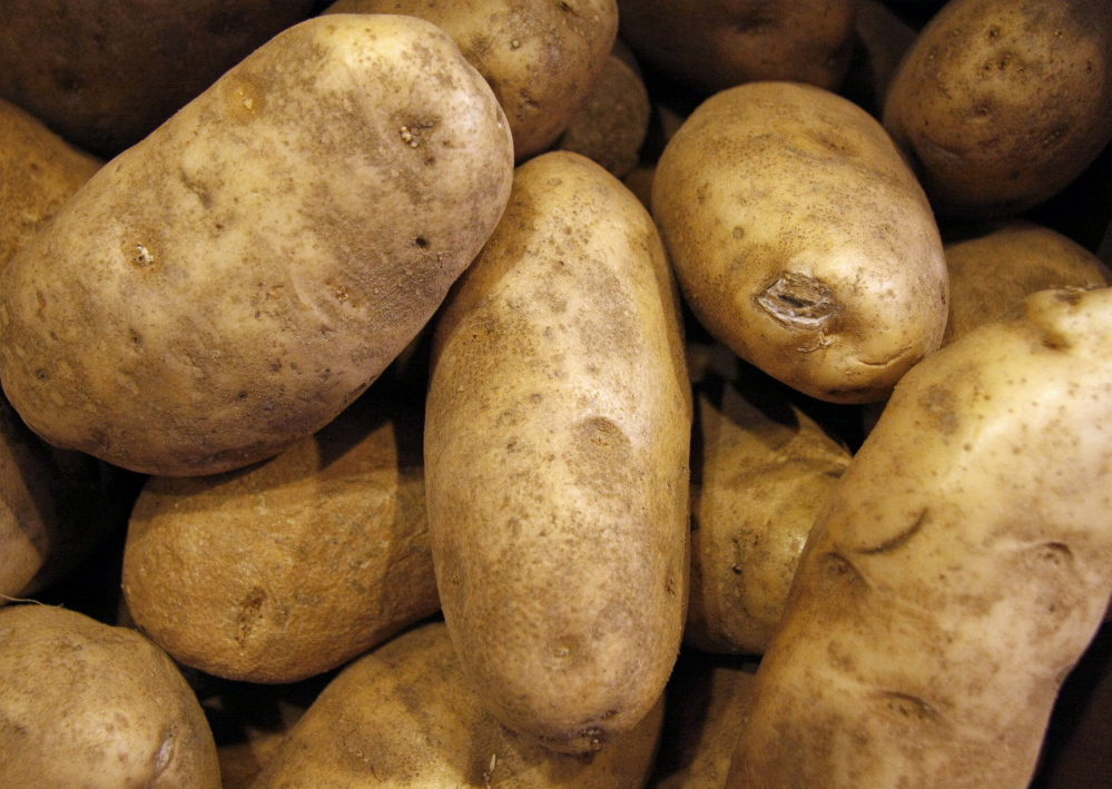 Potatoes are seen at Rosemount Market on Munjoy Hill in Portland in 2010. The fact that potatoes have been added back to the list of nutritional foods for the federal Woman, Infants and Children nutrition program is good news for Maine potato growers..