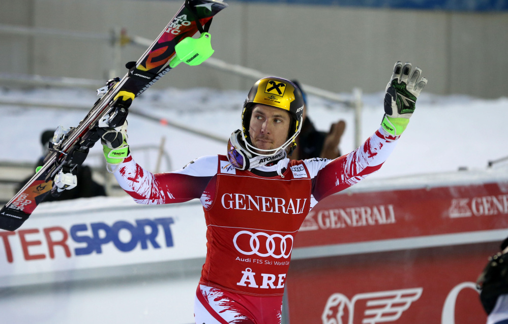 Marcel Hirscher celebrates in the finish area after winning an Alpine ski, men’s World Cup slalom in Are, Sweden, on Sunday. Austrian skier Marcel Hirscher overcame a first-leg deficit to edge out German skier Felix Neureuther and win a World Cup slalom race for his 26th career victory.