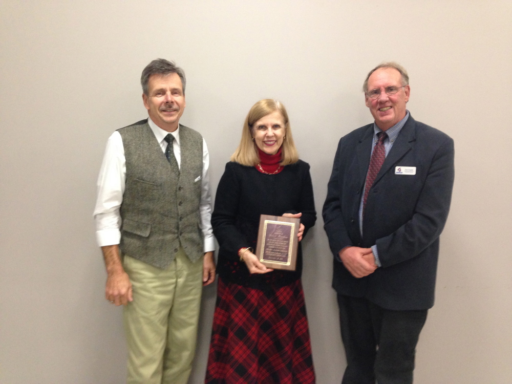 Contributed photo
Western Maine Community Action honors outgoing Board President F. Celeste Branham. From left are Norm Croteau, F. Celeste Branham and Fenwick L. Fowler.