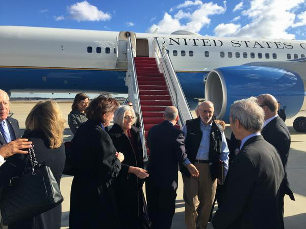 This handout photo from the Twitter account of Sen. Jeff Flake, R-Ariz. shows Alan Gross arriving at Andrews Air Force Base, Md., Wednesday.
