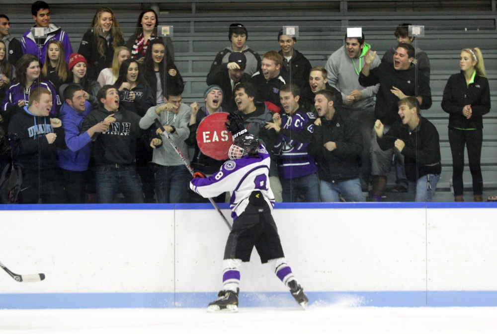 Waterville Senior High School’s Justin Wentworth celebrates a first period goal during Thursday night’s Eastern B game against Hampden Academy at Colby College in Waterville.