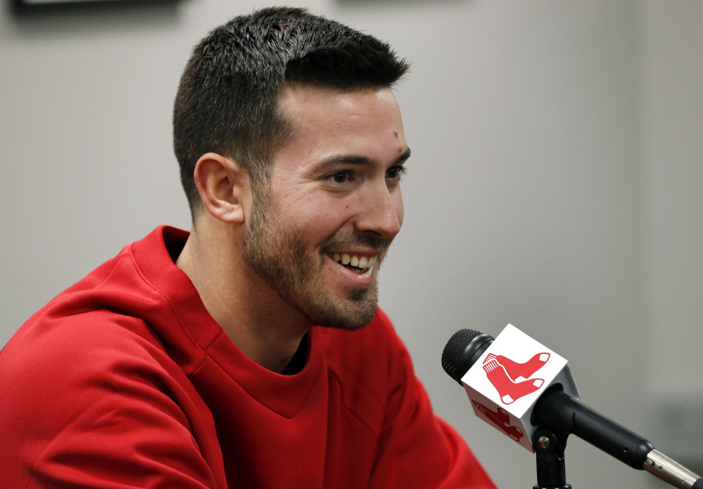 Newly acquired Boston Red Sox baseball pitcher Rick Porcello speaks in Boston on Friday. Porcello was recently traded to the Red Sox from the Detroit Tigers.