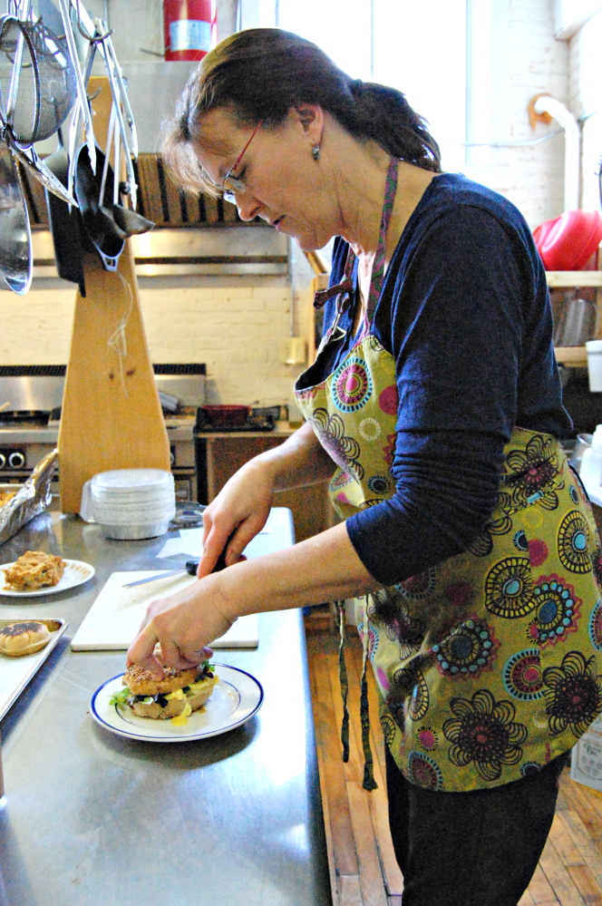 Barrels Community Market assistant manager Jean Rosborough prepares Saturday brunch. The craft-and-food cooperative on Main Street in Waterville plans to begin offering Sunday brunch after Jan. 1.