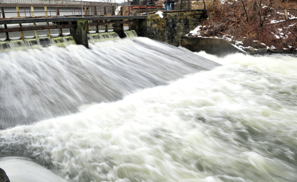 Cobbosseecontee Stream flows over the New Mills Dam on Thursday in Gardiner.