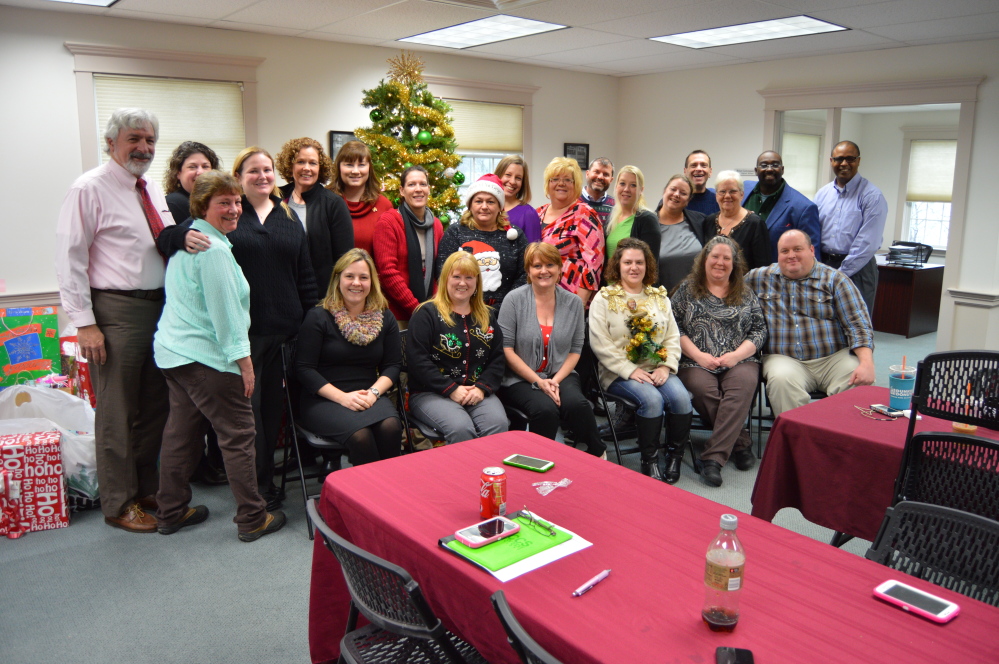 CCS personnel at the Dec. 18 Christmas party, CCS regional office in Augusta.