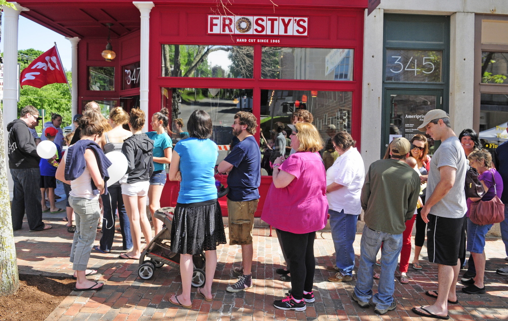 Pastry fans line up outside Frosty’s Donuts just after it opened in June in downtown Gardiner. Some fear the loss of a full-time economic development director in the city will jeopardize future new business ventures, such as Frosty’s, that were brought to the city through the Gardiner Growth Initiative.