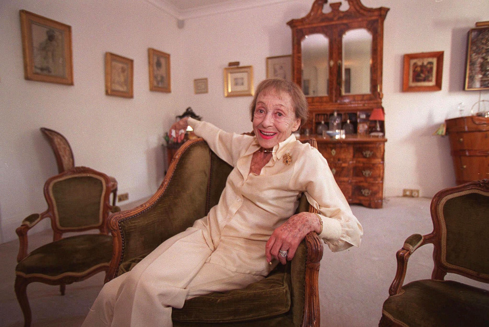 In this July 29, 1999 file photo, actress Luise Rainer poses in her central London apartment.