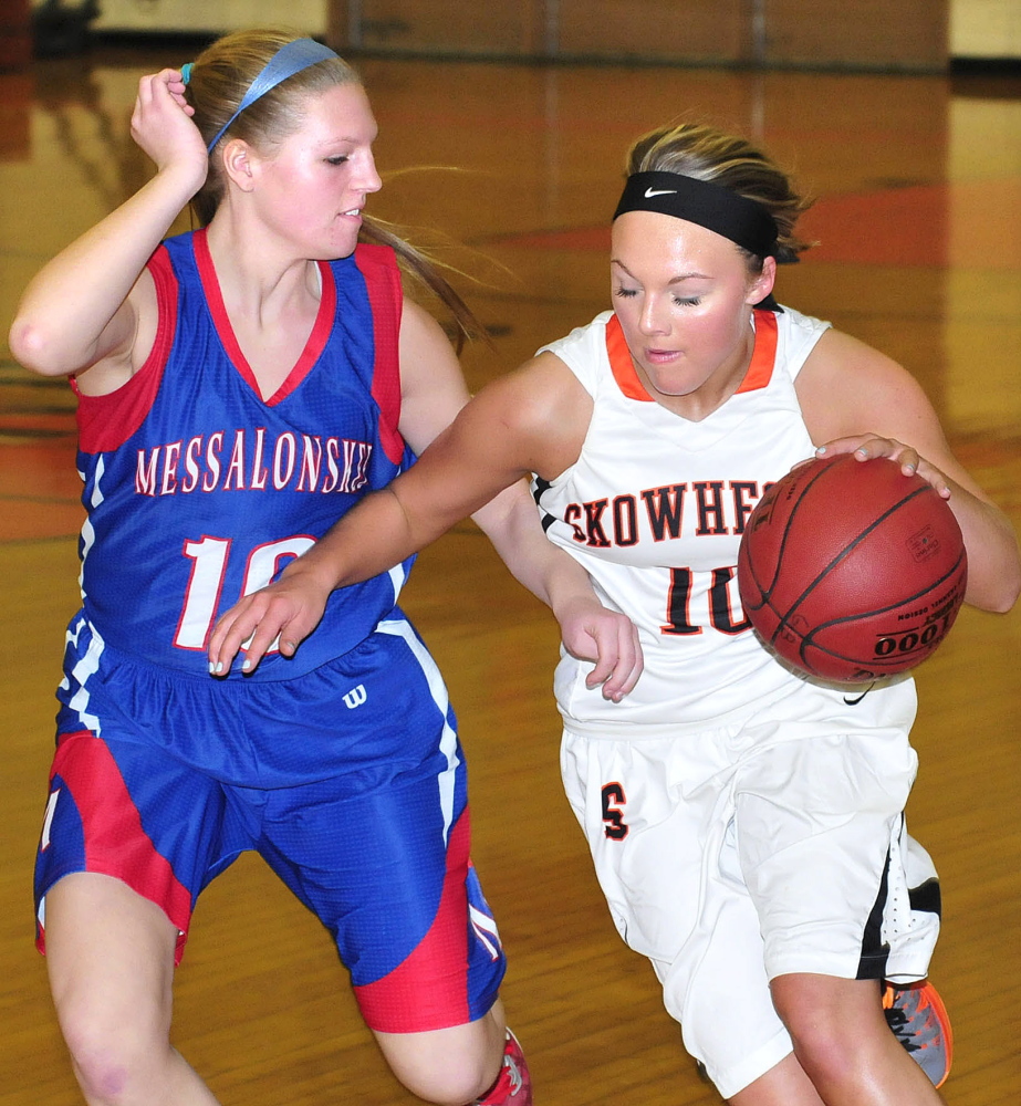 Messalonskee’s Taylor Poissonnier attempts to block Skowhegan’s Eliza Bedard during a game on Tuesday.