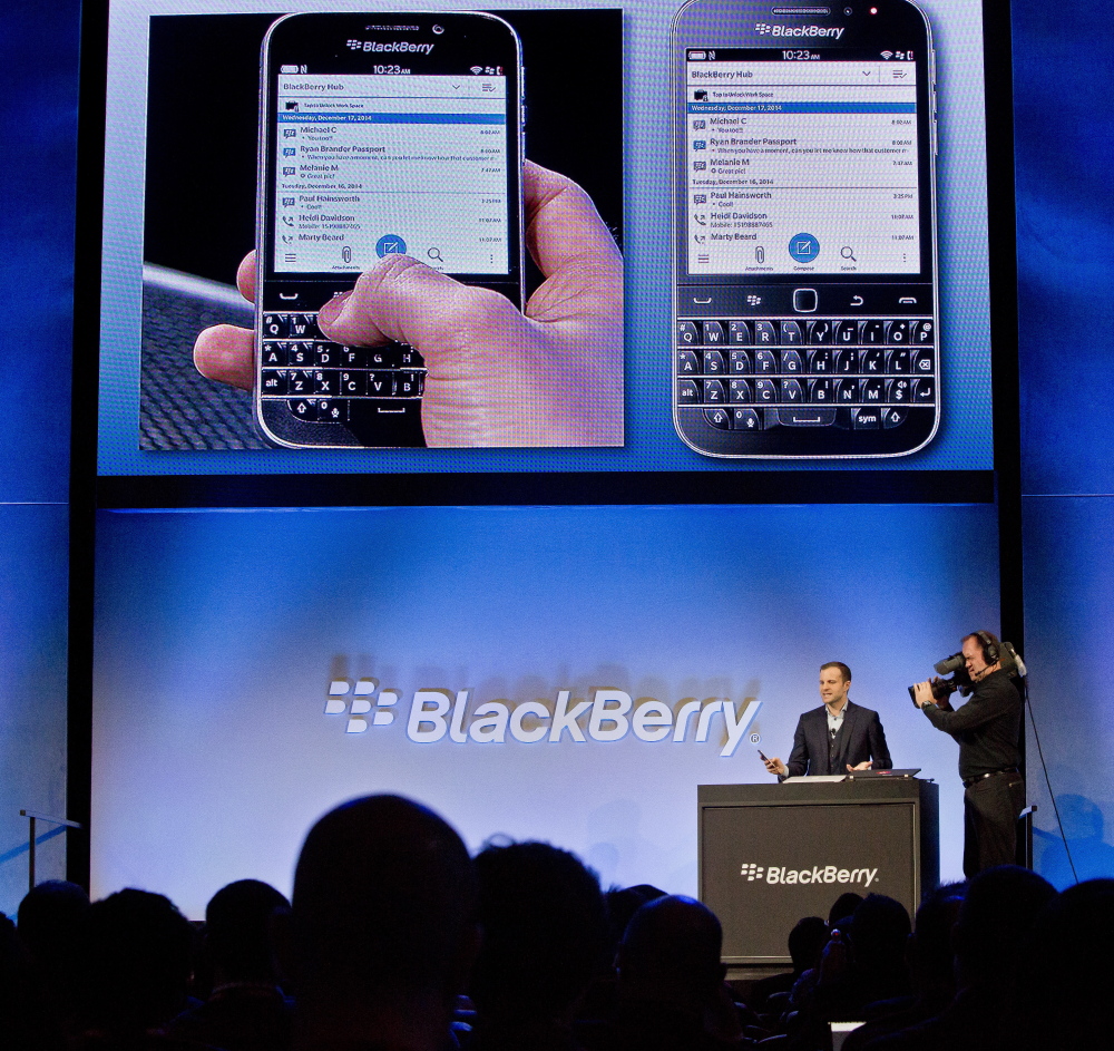 Jeff Gadway, BlackBerry’s director of marketing and enterprise, demonstrates the company’s new BlackBerry Classic phone Wednesday in New York.

