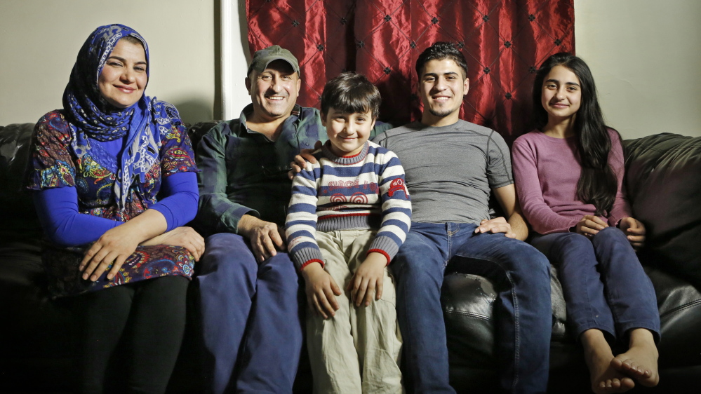 Fouad Abdullah, second from right, and his family, are from left: his mother Hannan Shafeek; his father, Mohammed Mohammed; his brother Murad Abdullah and sister Doaa Abdullah. Photo by Gregory Rec/Staff Photographer
