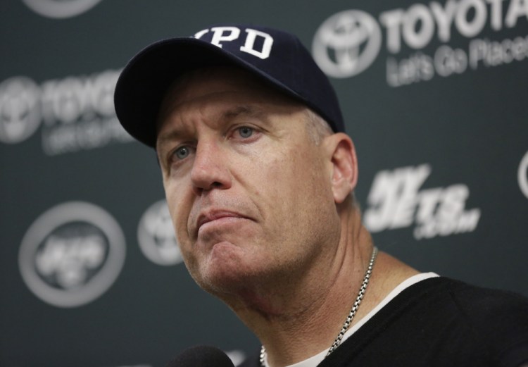 New York Jets head coach Rex Ryan listens to a questions during a news conference Sunday following an NFL football game against the Miami Dolphins, in Miami Gardens, Fla. The Asssociated Press