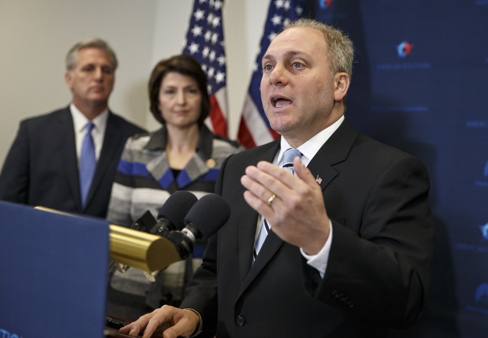 In this Nov. 18, 2014 file photo, House Majority Whip Steve Scalise of La., right, with House Majority Leader Kevin McCarthy of Calif., left, and Rep. Cathy McMorris Rodgers, R-Wash., speaks to reporters on Capitol Hill in Washington, following a House GOP caucus meeting. The Associated Press