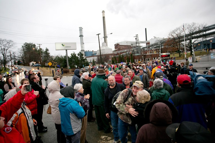 Workers leaving the Verso Paper mill are greeted by hundreds of community members as their final shift ends Wednesday. The paper machines shut down a couple of weeks ago and the mill has been silent as workers have cleaned it and prepared it for a sale. Parent company Verso Paper has a deal to sell the plant for $60 million to American Iron & Metal.