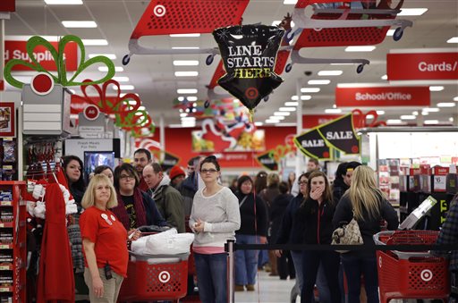 Target shoppers wait to check out on Black Friday in South Portland. The store opened at midnight. The Associated Press/Robert F. Bukaty