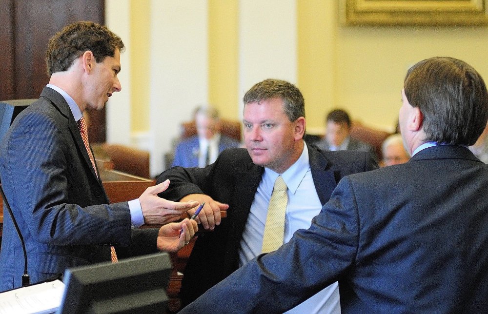 Sen. Michael Thibodeau, R-Winterport, center, said the split between the chambers of the Maine Legislature could encourage cooperation because both Republicans and Democrats understand compromise will be a vital component in getting anything done. 2014 Kennebec Journal File Photo/Joe Phelan