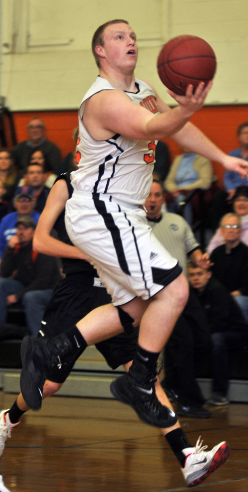Gardiner’s Brad Weston goes up for a shot during a game Friday at Gardiner Area High School.