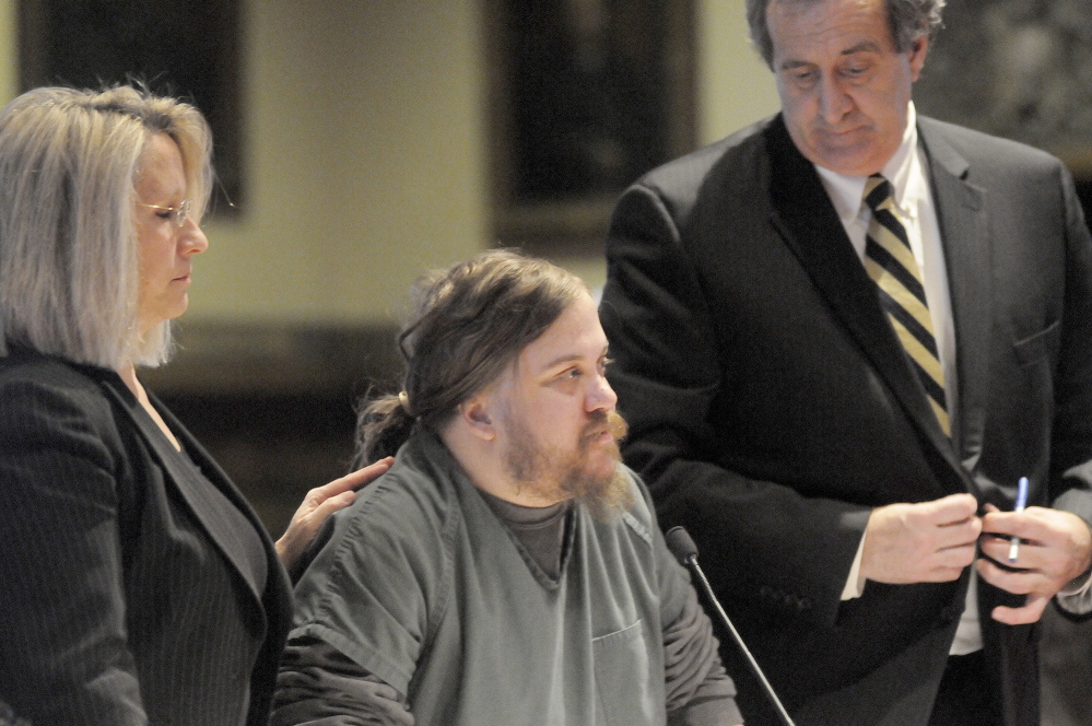 Eric Bard is flanked Monday by his attorneys, Gina Yamartino and Ronald Bourget, during a hearing at Kennebec County Superior Court in Augusta.