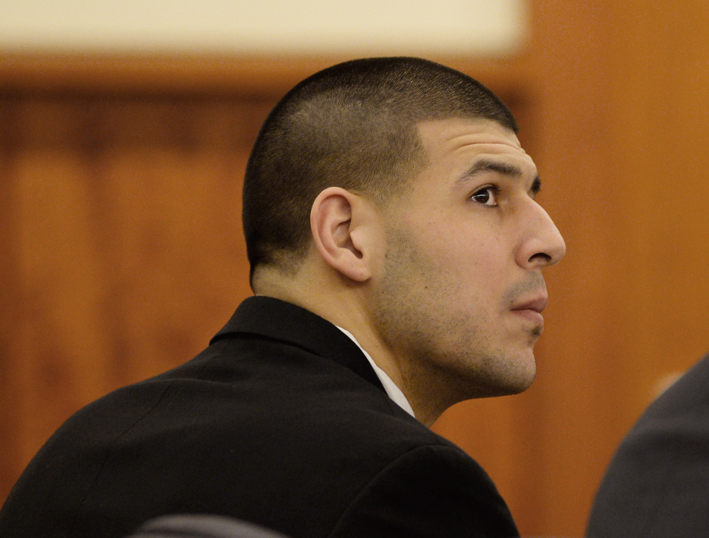 Former New England Patriots football player Aaron Hernandez attends a pretrial hearing in the first of two murder cases against him at Bristol County Superior Court in Fall River, Mass., on Tuesday.