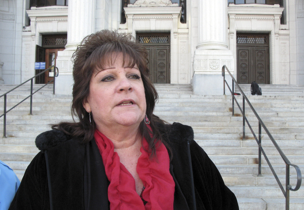 Jackie Fortin of Windsor Locks, Conn., speaks outside the Connecticut Supreme Court in Hartford, Conn., on Thursday, shortly after the court ruled the that state child protection officials aren’t violating the rights of her 17-year-old daughter by forcing the girl to undergo cancer chemotherapy she doesn’t want.