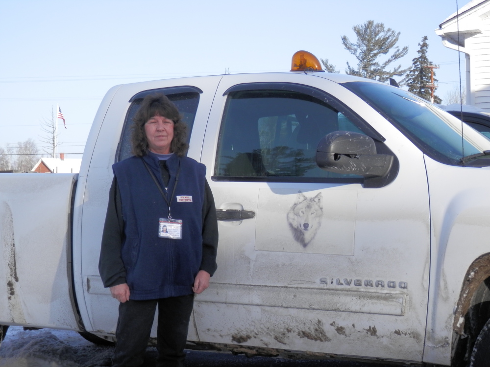 Mary Hughey, a contract driver for the U.S. Postal Service in Jackman, interrupted her route delivery to corrall two horses that had wandered on to Route 201 before they could pose a risk to traffic.