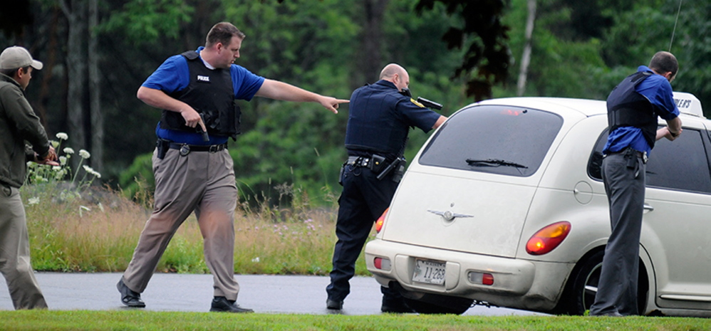 Augusta police officers surrounded a taxi with guns drawn following a July 16 traffic stop on Western Avenue in Augusta, in which police detained two men, one of them William Seabron.