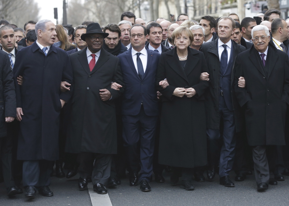World leaders marching in the Paris rally included, from left, Israeli Prime Minister Benjamin Netanyahu, Malian President Ibrahim Boubacar Keita, French President Francois Hollande, German Chancellor Angela Merkel, EU President Donald Tusk and Palestinian Authority President Mahmoud Abbas. “The entire world is under attack” from radical Islam, Netanyahu said.