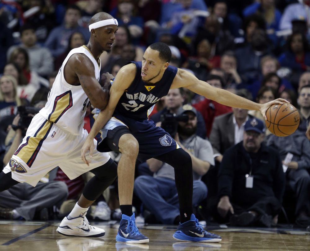Memphis Grizzlies forward Tayshaun Prince, right, has been traded to the Boston Celtics as part of a 3-team trade. The deal was announced Monday.
