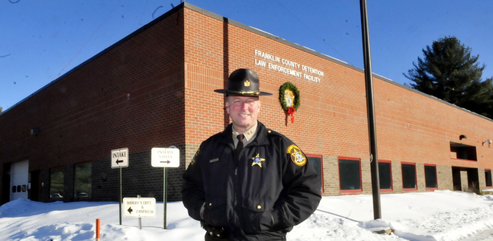 Franklin County Sheriff Scott Nichols stands outside the county jail in Farmington on Tuesday. The state Board of Corrections has voted to reopen the jail, which had been reduced to a holding facility.