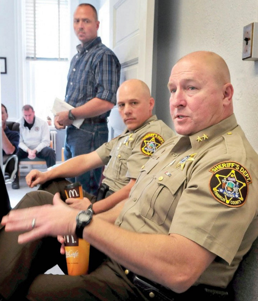 Franklin County Sheriff Scott Nichols, foreground, Chief Deputy Steve Lowell and jail adminstrator Doug Blauvelt at a county commissioners’ meeting on the jail’s status. State officials approved making the facility a full-time lock-up Tuesday after years of housing inmates for a maximum of three days each.