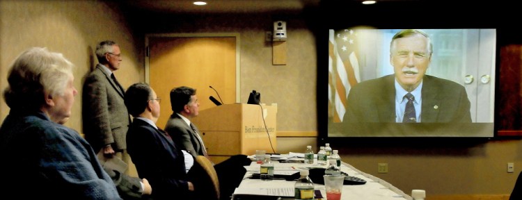 U.S. Sen. Angus King, I-Maine, gives his support to officials via live video during a news conference Tuesday at Franklin Memorial Hospital in Farmington. Officials announced the results of a long-term study of cardiovascular diseases published Tuesday in the Journal of American Medical Association. Listening from left are Sandra Record, Dr. Daniel Onion, Dr. Burgess Record and Gerald Cayer.