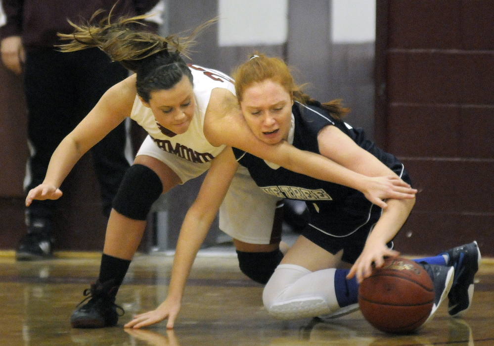 Richmond High School’s Camryn Hurley, left, attempts to block Pine Tree Academy’s Angel Hood during a Wednesday’s game in Richmond.