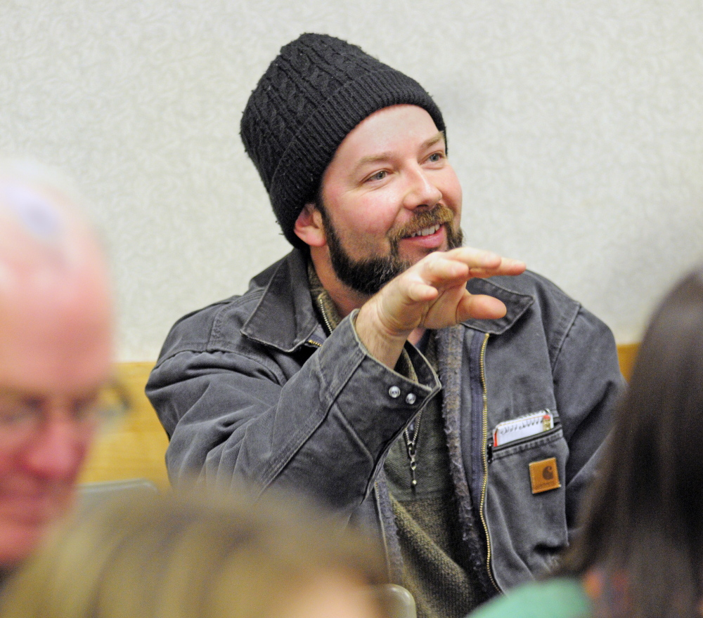 Matt Carter, associate farm manager at Pietree Orchard in the town of Sweden, asks a question during a lecture on social media marketing Thursday during the 74th Annual Agricultural Trades Show at the Augusta Civic Center.