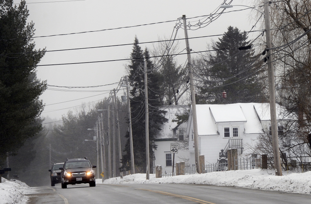 Vehicles make their way down Pequawket Trail on Thursday in West Baldwin near the West Baldwin Fire Department.
