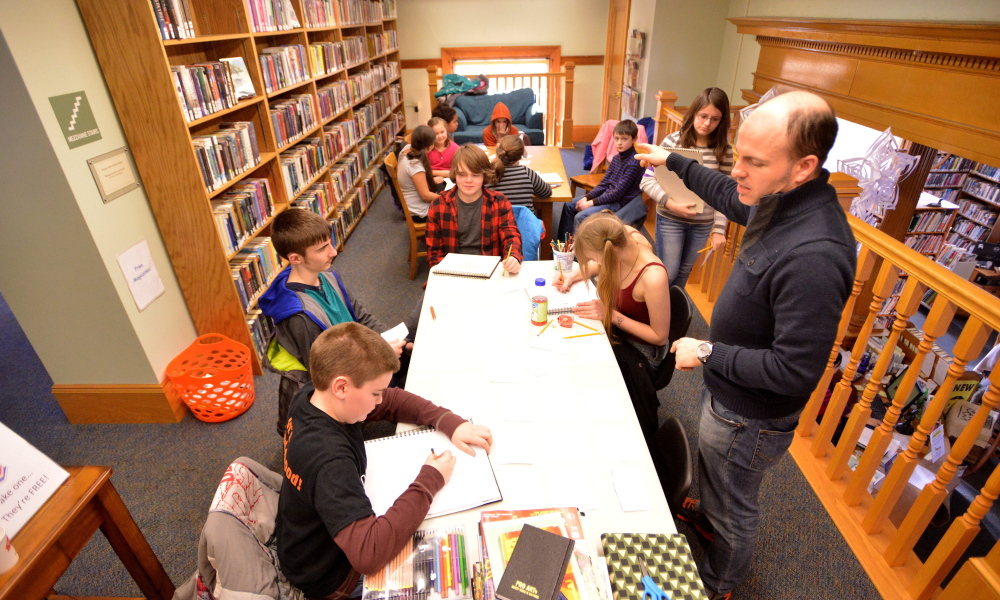 Dan Ryder, right, facilitates a comic book workshop with area kids at the Wilton Free Public Library in Wilton on Saturday.